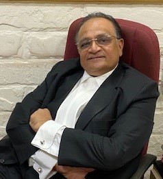 Adv. Hasmukh Shah